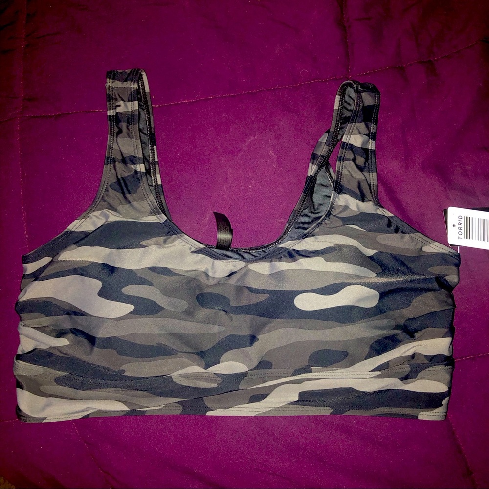Torrid sports bra but could be used as a swim top.  Built in breast pads.